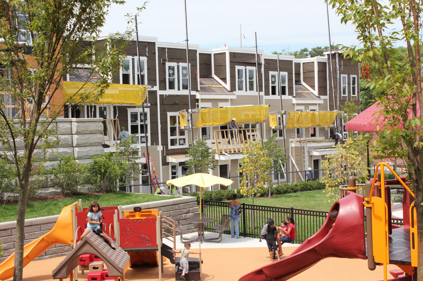 Housing behind a children's playground